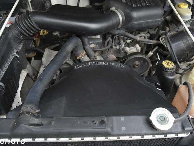 Джип Вранглер, объемом двигателя 2.46 л и пробегом 91 тыс. км за 12937 $, фото 12 на Automoto.ua
