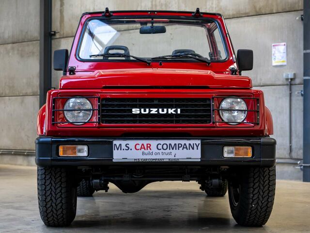 Красный Сузуки Самурай, объемом двигателя 1.3 л и пробегом 65 тыс. км за 24999 $, фото 2 на Automoto.ua