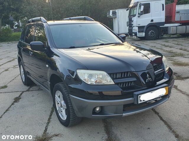 Мицубиси Аутлендер 2005 в Европе на Automoto.ua Черный Мицубиси Аутлендер, объемом двигателя 1 л и пробегом 227 тыс. км за 15900 $, фото 21 на Automoto.ua