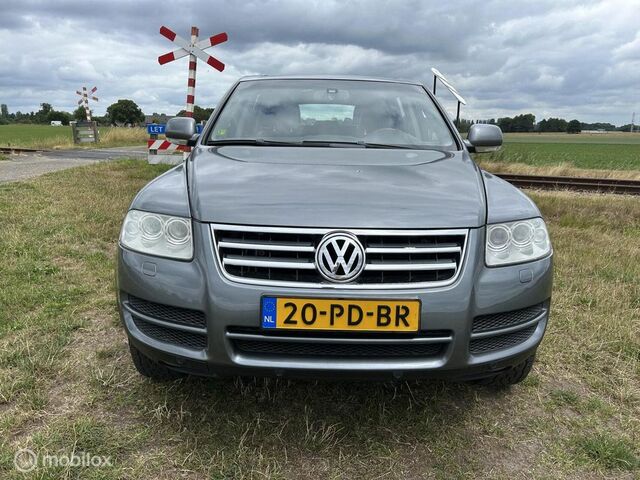 Фольксваген Туарег 2004 у Європі на Automoto.ua Сірий Фольксваген Туарег, об'ємом двигуна 3.19 л та пробігом 282 тис. км за 4113 $, фото 10 на Automoto.ua