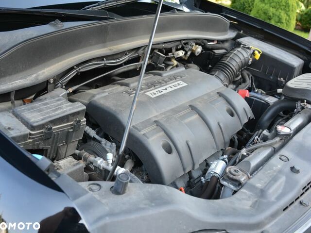 Хонда Риджлайн, объемом двигателя 3.49 л и пробегом 299 тыс. км за 13607 $, фото 23 на Automoto.ua