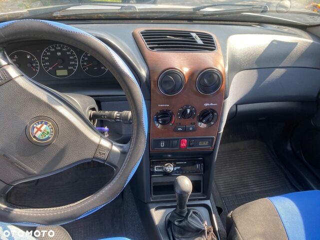 Альфа Ромео 146 2000 в Европе на Automoto.ua Серый Альфа Ромео 146, объемом двигателя 1 л и пробегом 170 тыс. км за 412 $, фото 3 на Automoto.ua