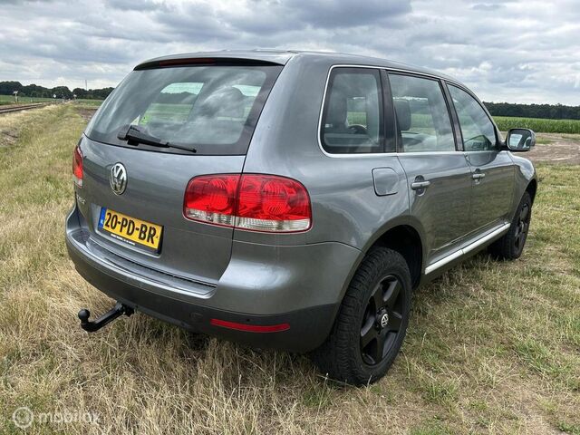 Фольксваген Туарег 2004 у Європі на Automoto.ua Сірий Фольксваген Туарег, об'ємом двигуна 3.19 л та пробігом 282 тис. км за 4113 $, фото 2 на Automoto.ua