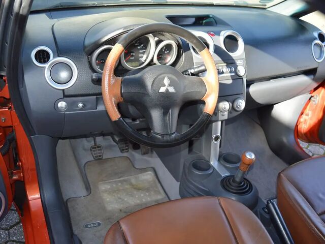 Мицубиси Кольт 2007 в Европе на Automoto.ua Оранжевый Мицубиси Кольт, объемом двигателя 1.5 л и пробегом 161 тыс. км за 3203 $, фото 5 на Automoto.ua
