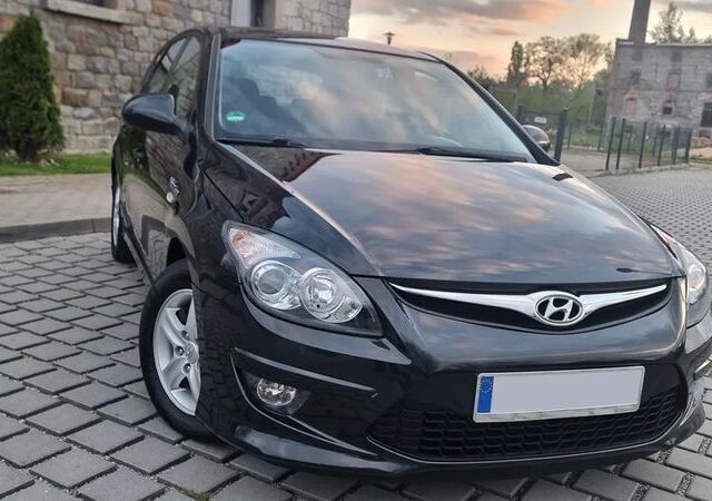 Хендай i30, объемом двигателя 1.4 л и пробегом 119 тыс. км за 5032 $, фото 4 на Automoto.ua