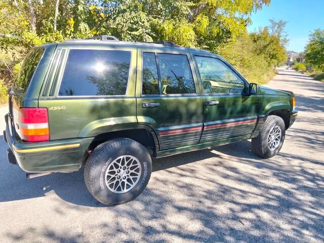 Джип Гранд Чероки 1995 в Европе на Automoto.ua Зеленый Джип Гранд Чероки, объемом двигателя 5.22 л и пробегом 187 тыс. км за 9342 $, фото 7 на Automoto.ua