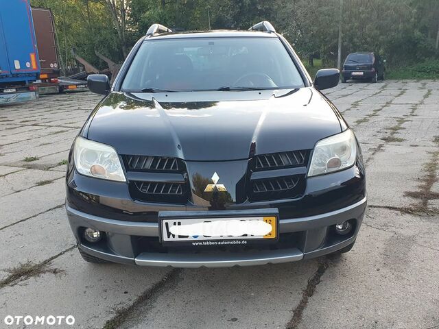 Мицубиси Аутлендер 2005 в Европе на Automoto.ua Черный Мицубиси Аутлендер, объемом двигателя 1 л и пробегом 227 тыс. км за 15900 $, фото 13 на Automoto.ua