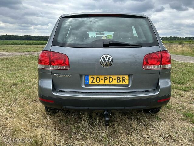 Фольксваген Туарег 2004 у Європі на Automoto.ua Сірий Фольксваген Туарег, об'ємом двигуна 3.19 л та пробігом 282 тис. км за 4113 $, фото 11 на Automoto.ua