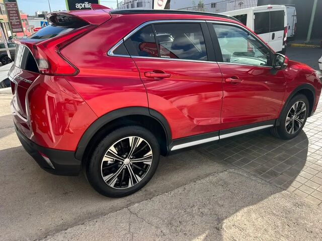 Мицубиси Eclipse Cross 2019 в Европе на Automoto.ua Красный Мицубиси Eclipse Cross, объемом двигателя 1.5 л и пробегом 91 тыс. км за 17995 $, фото 5 на Automoto.ua
