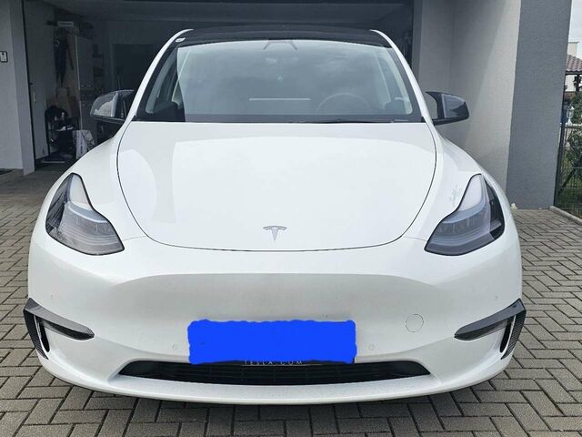 Белый Тесла Model Y, объемом двигателя 0 л и пробегом 25 тыс. км за 52061 $, фото 2 на Automoto.ua