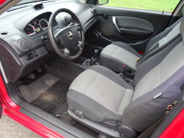 Шевроле Авео 2011 в Европе на Automoto.ua Красный Шевроле Авео, объемом двигателя 0 л и пробегом 277021 тыс. км за 1995 $, фото 8 на Automoto.ua