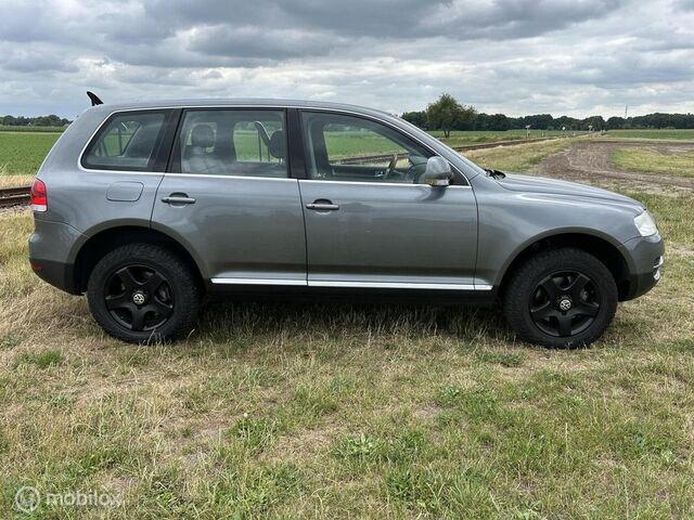 Фольксваген Туарег 2004 у Європі на Automoto.ua Сірий Фольксваген Туарег, об'ємом двигуна 3.19 л та пробігом 282 тис. км за 4113 $, фото 7 на Automoto.ua