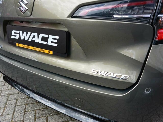 Зелений Сузукі swace, об'ємом двигуна 1.8 л та пробігом 65 тис. км за 24973 $, фото 13 на Automoto.ua