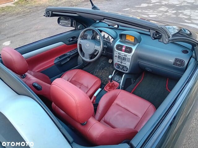 Опель Тигра 2008 в Европе на Automoto.ua Черный Опель Тигра, объемом двигателя 1 л и пробегом 226 тыс. км за 17500 $, фото 14 на Automoto.ua