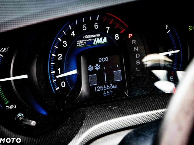 Хонда Инсайт, объемом двигателя 1.34 л и пробегом 125 тыс. км за 6371 $, фото 12 на Automoto.ua