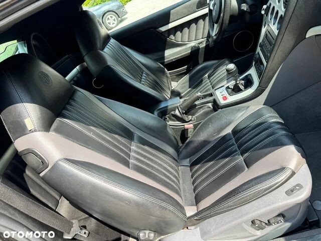 Альфа Ромео Spider 2007 у Європі на Automoto.ua Чорний Альфа Ромео Spider, об'ємом двигуна 2.39 л та пробігом 130 тис. км за 6756 $, фото 32 на Automoto.ua
