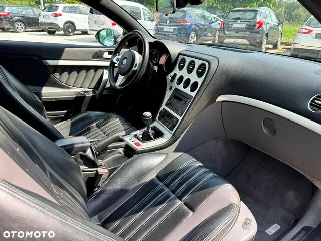 Альфа Ромео Spider 2007 у Європі на Automoto.ua Чорний Альфа Ромео Spider, об'ємом двигуна 2.39 л та пробігом 130 тис. км за 6756 $, фото 33 на Automoto.ua