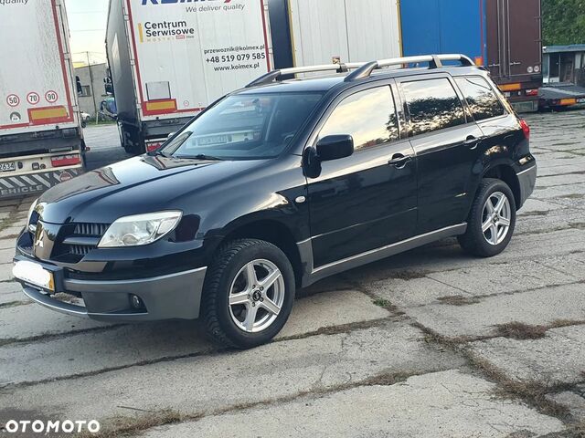 Мицубиси Аутлендер 2005 в Европе на Automoto.ua Черный Мицубиси Аутлендер, объемом двигателя 1 л и пробегом 227 тыс. км за 15900 $, фото 19 на Automoto.ua